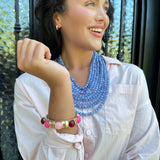 Dome Shaped Gold Bangle with Pink Accented Stones