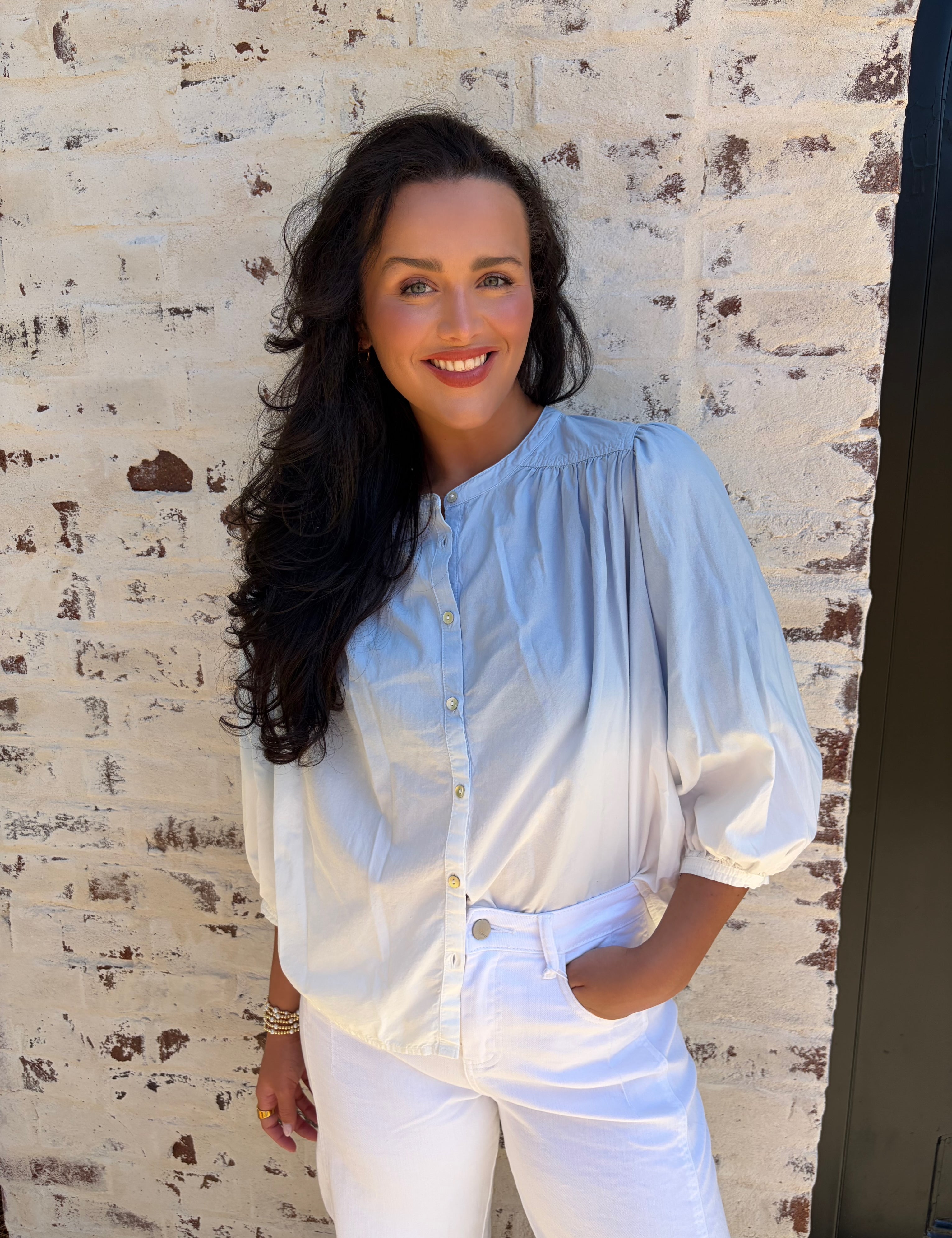 light blue ombre blouse with white barrel jeans