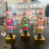 Glitterville Rainbow Colonel Cupcake Nutcracker Figure