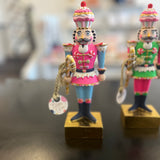 Glitterville Rainbow Colonel Cupcake Nutcracker Figure