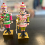 Glitterville Rainbow Colonel Cupcake Nutcracker Figure