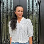 Striped navy and white scalloped blouse with v neckline