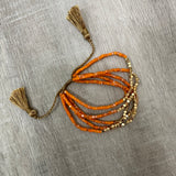 Beaded Pull Bracelet in Orange & Gold